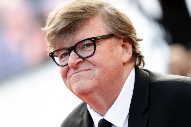 703520-michael-20moore-afp